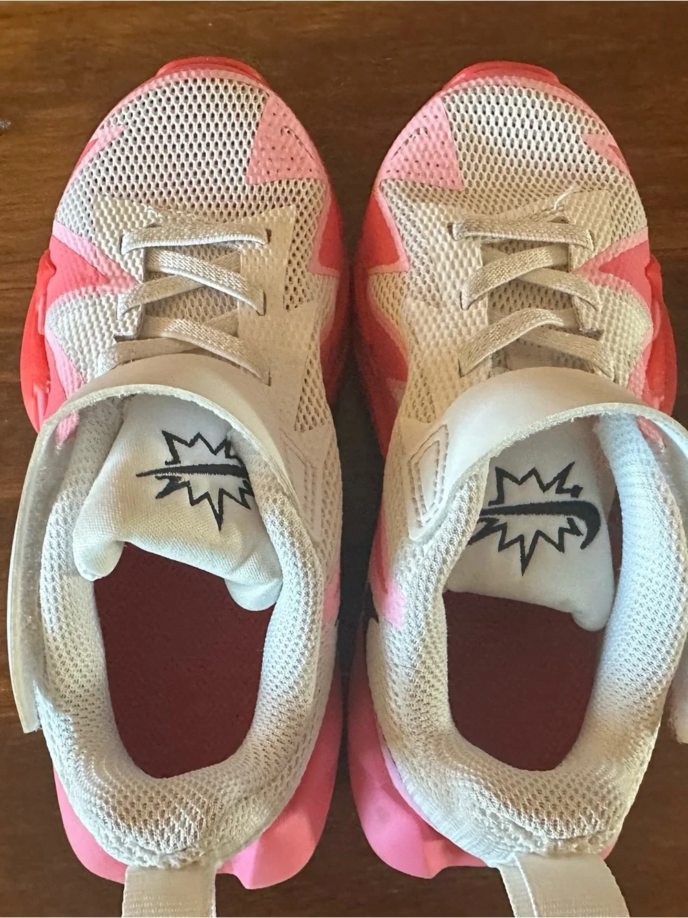 Nike Kids White Sneakers with Pink and Hot Pink Accents and Black Swoosh